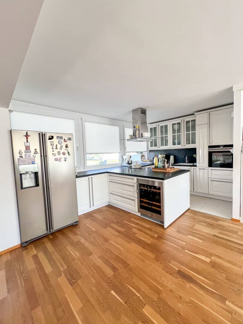 Exklusive Wohnung mit Garten und Wohnküche