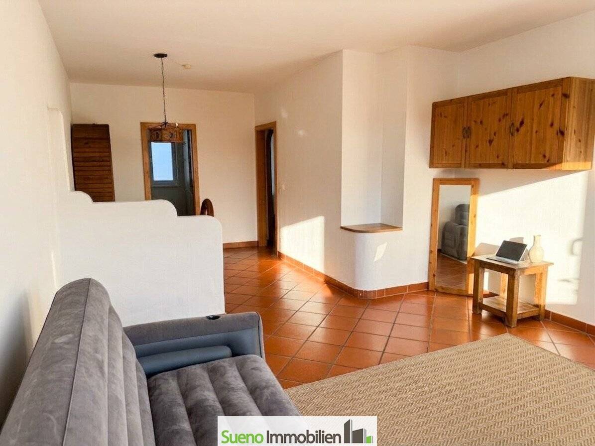 Top floor apartment with balcony and underground parking