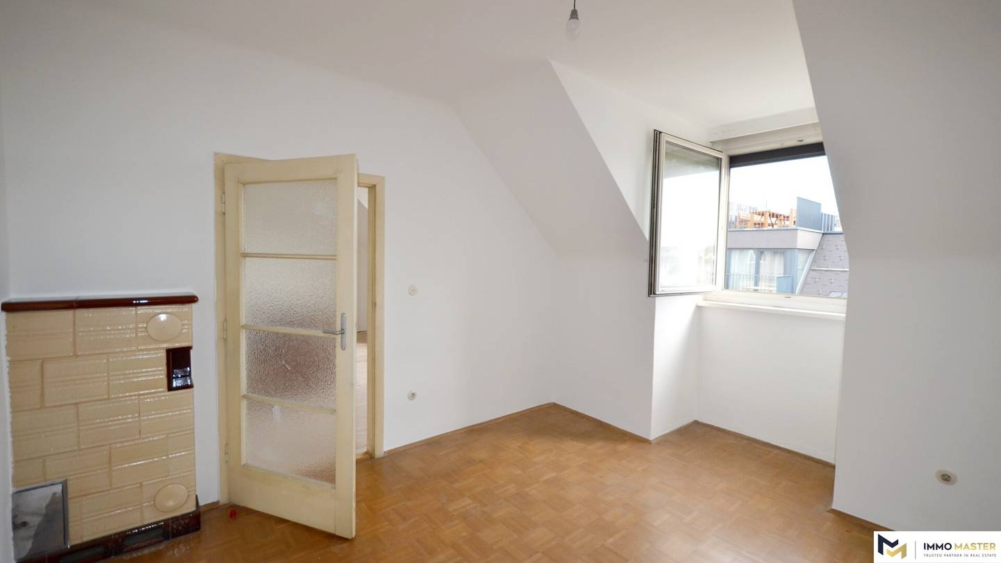 Apartment with city view and fireplace in attic