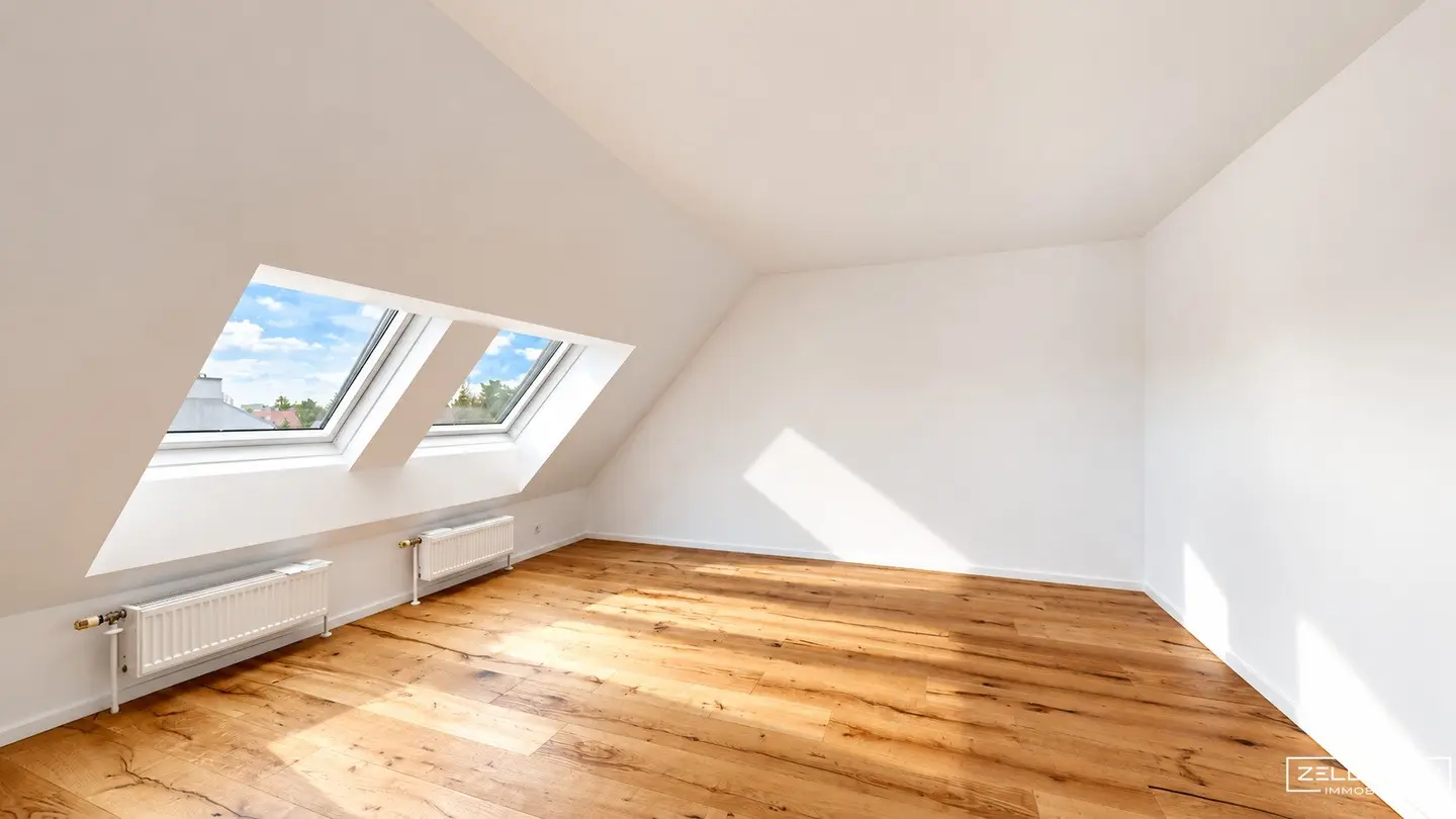 NEAR RIVERSIDE | Attic apartment with spacious living area, 3 rooms + separate kitchen | ZELLMANN IMMOBILIEN