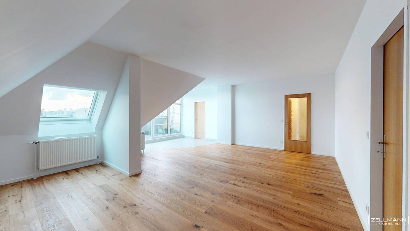NEAR RIVERSIDE | Attic apartment with spacious living area, 3 rooms + separate kitchen | ZELLMANN IMMOBILIEN