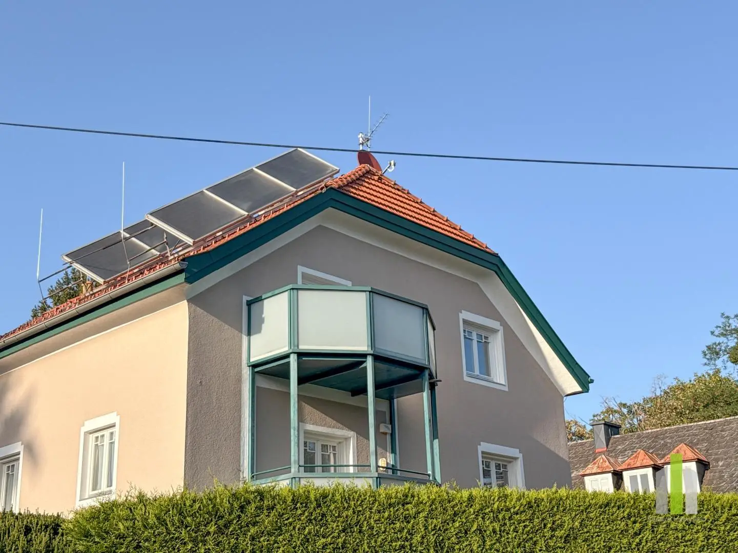Top floor apartment with private garden and south facing balcony