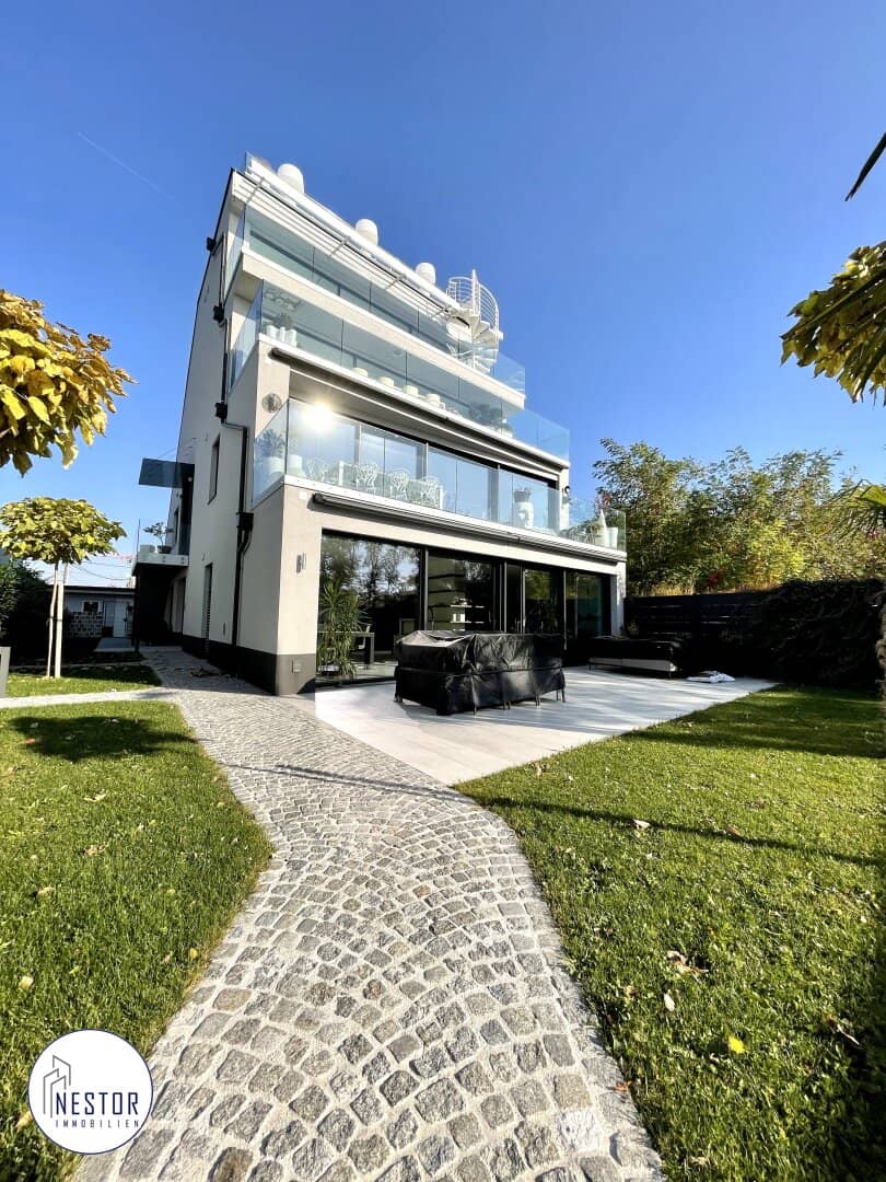 Wohnung erste Reihe Alte Donau mit Privatgarten