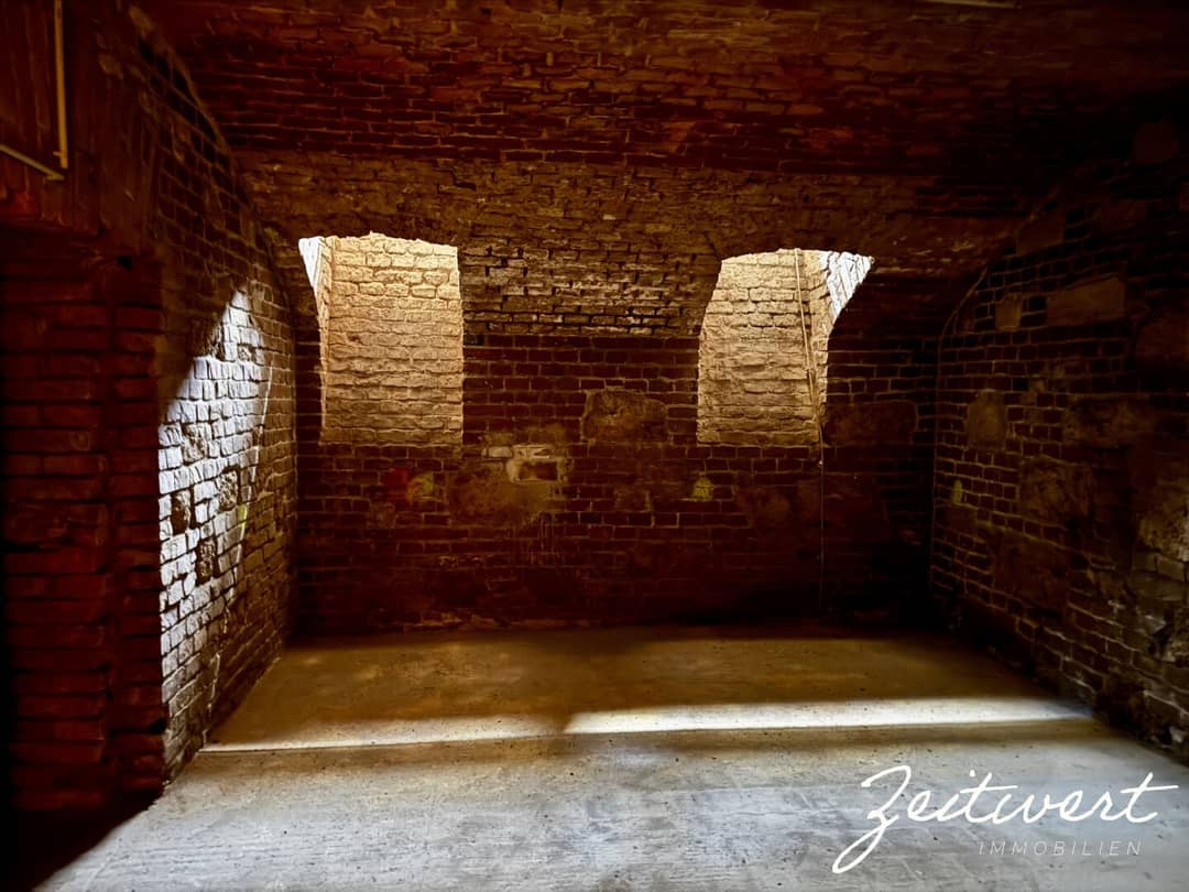 Vaulted cellar with exposed bricks