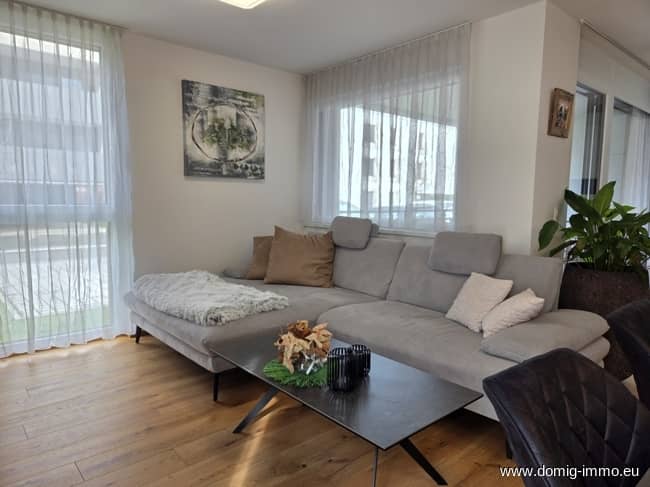 Hochwertige Wohnung mit Terrasse und Gartenanteil