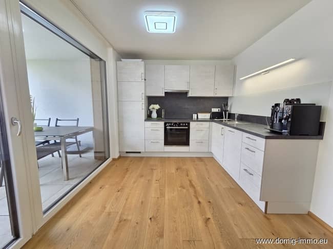 Hochwertige Wohnung mit Terrasse und Gartenanteil