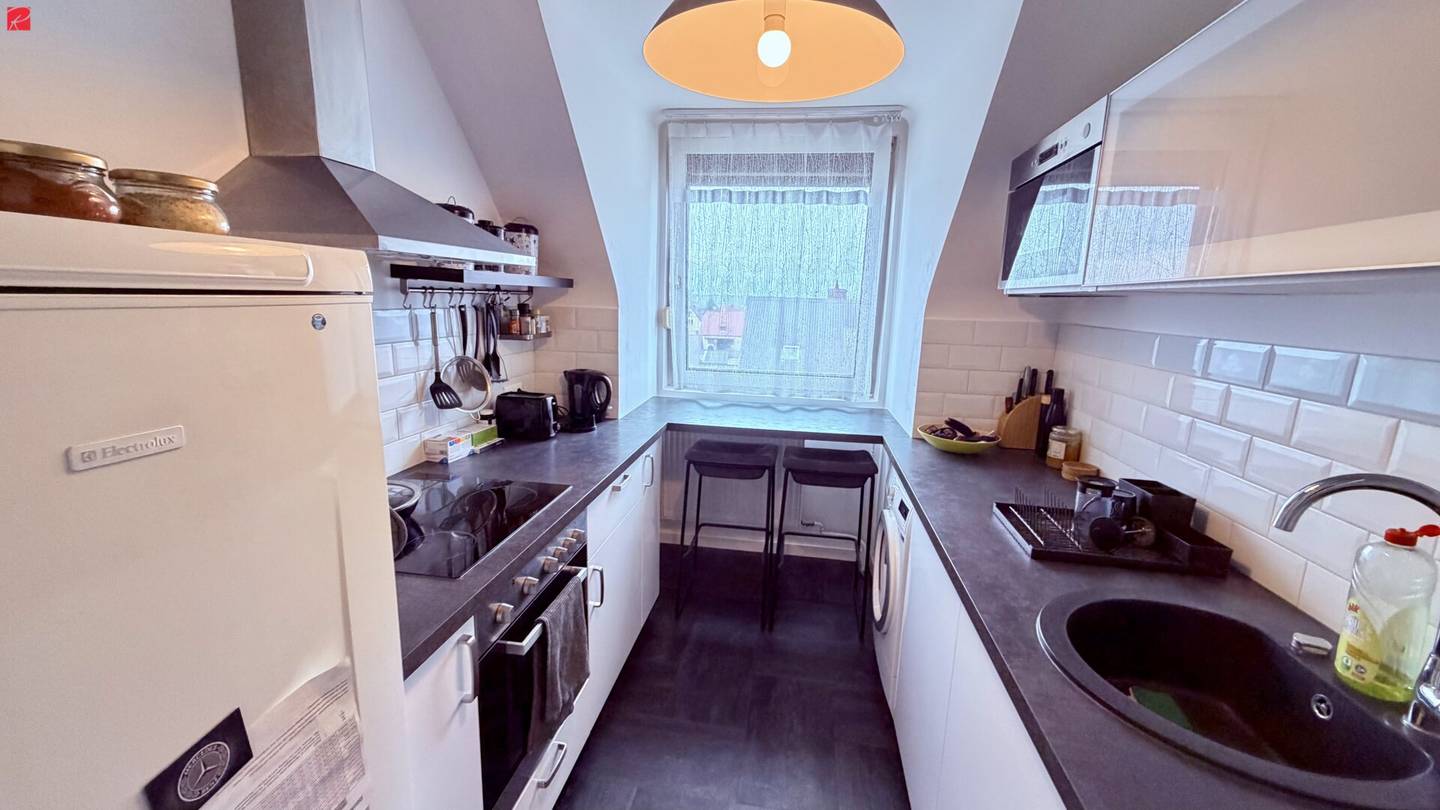 Dachgeschosswohnung neuwertig mit Gartenbenutzung