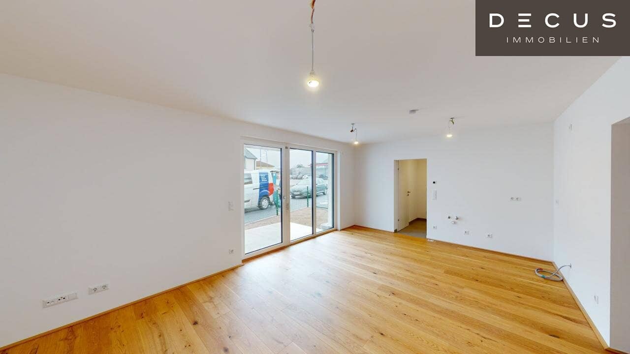 Wohnung im Neubau mit Garten und Terrasse