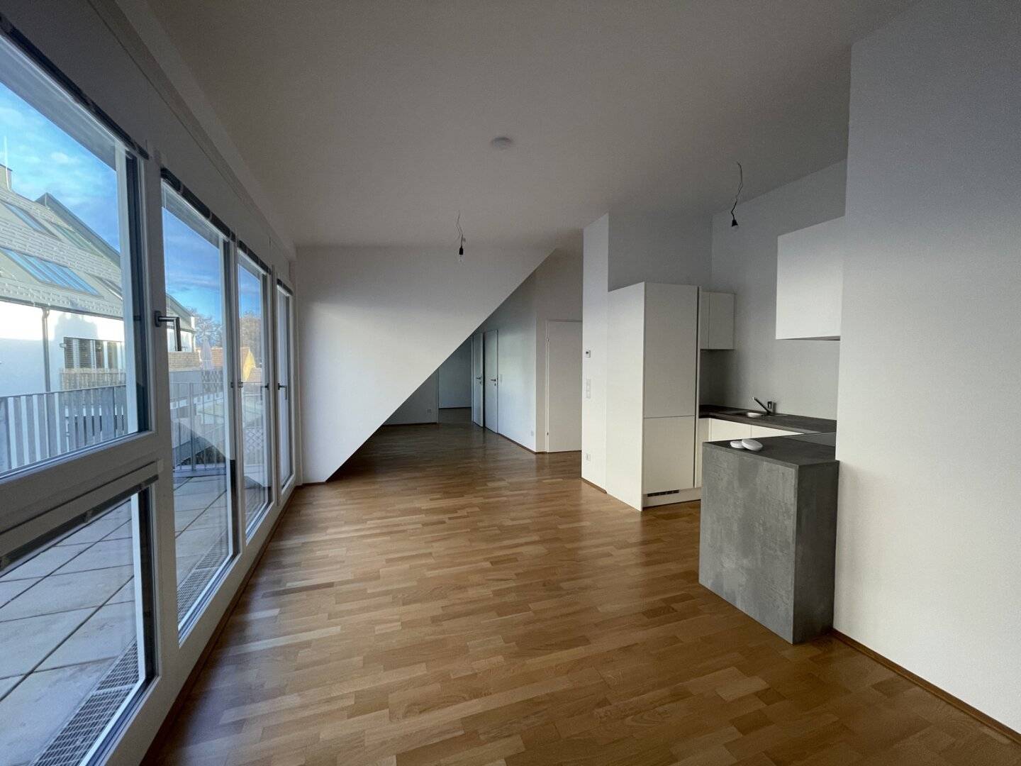 Apartment terrace in green setting near transit