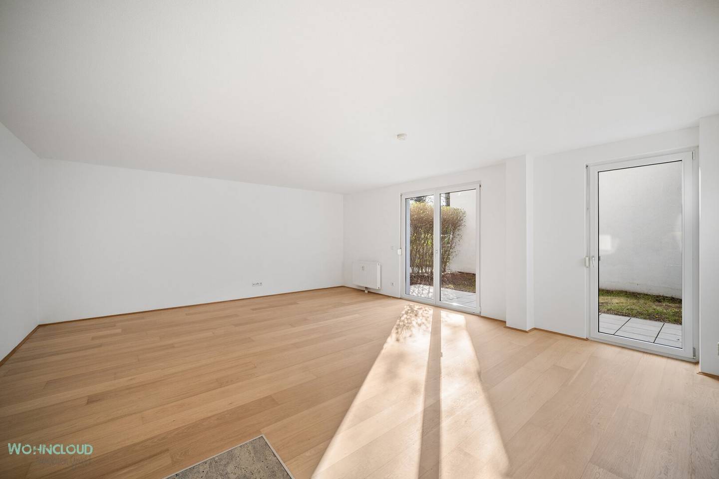 Wohnung im Erdgeschoss mit Terrasse und Garten