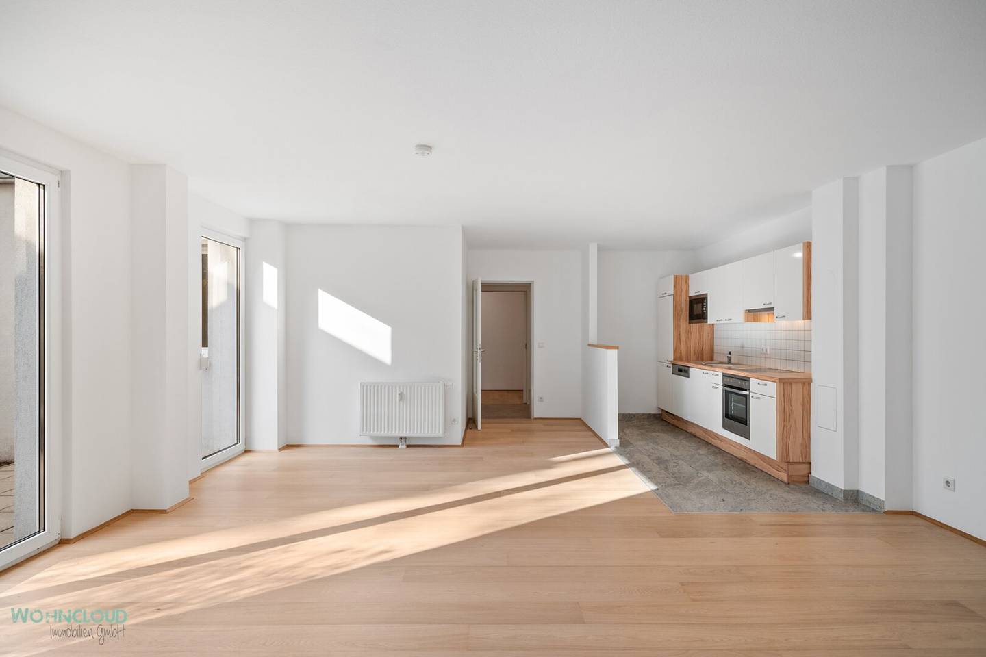 Wohnung im Erdgeschoss mit Terrasse und Garten