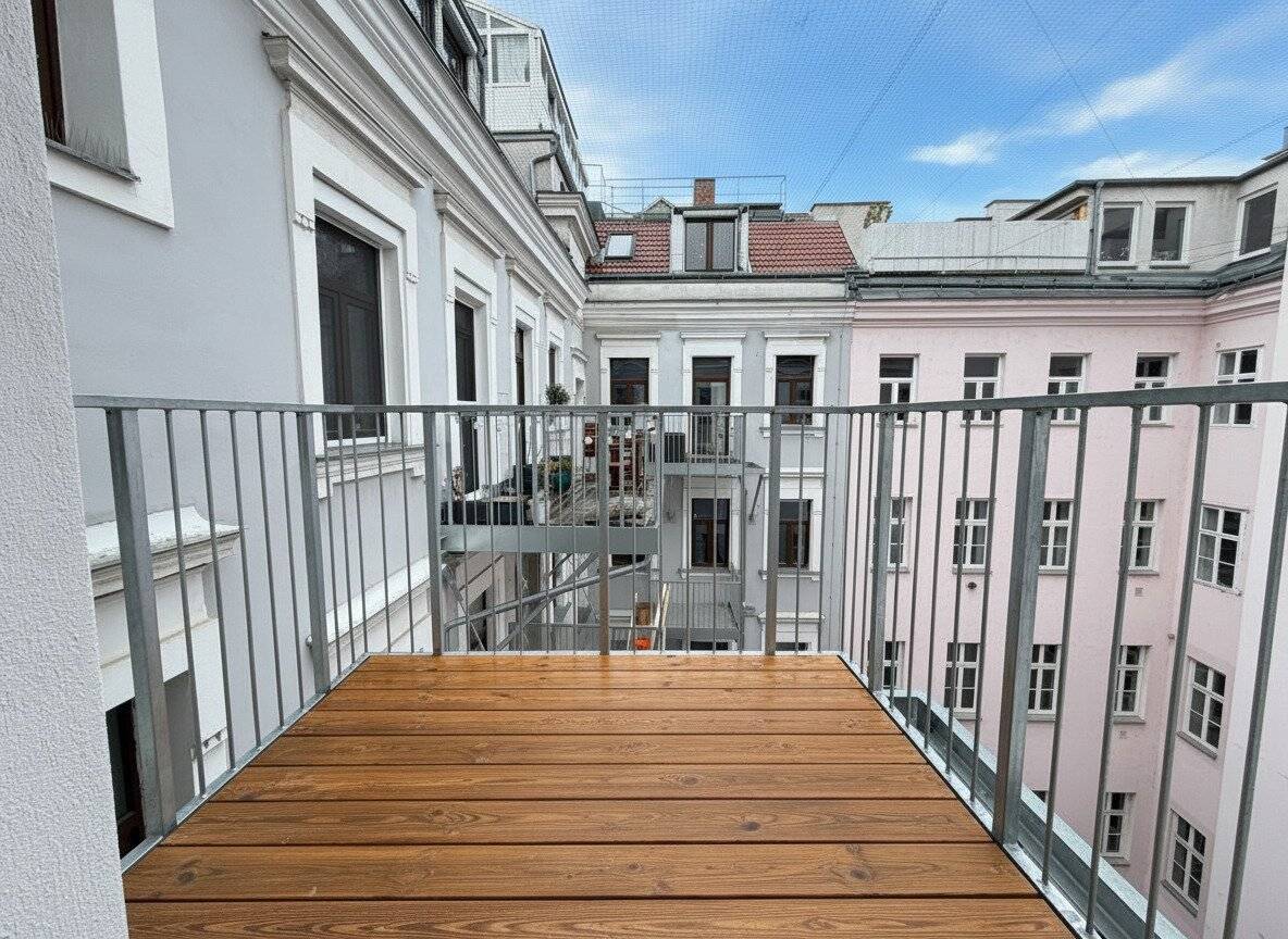 Renovated historic apartment with courtyard balcony