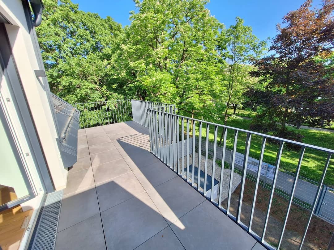 Dachgeschosswohnung im Grünen mit Balkon
