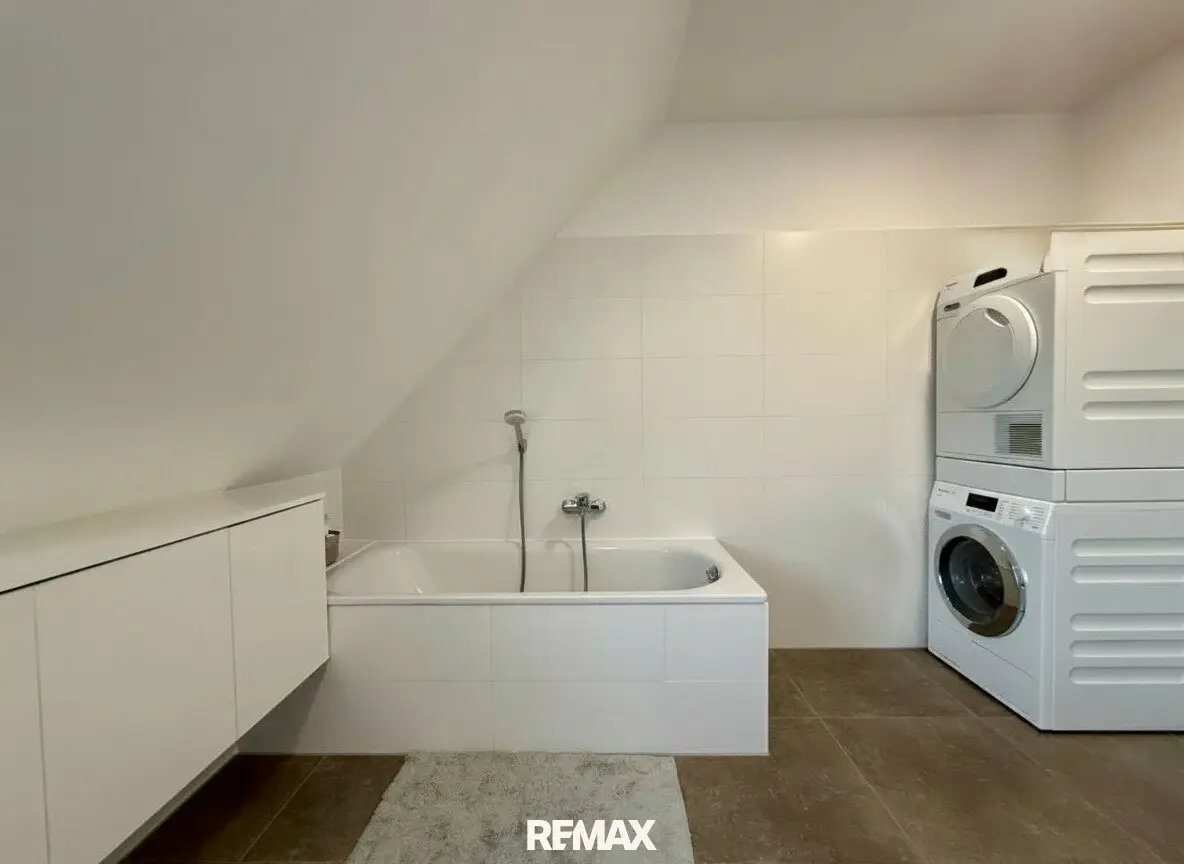 Attic duplex with two roof terraces