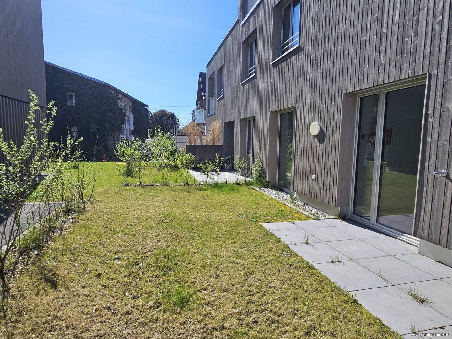 Ground floor apartment in new build with garden