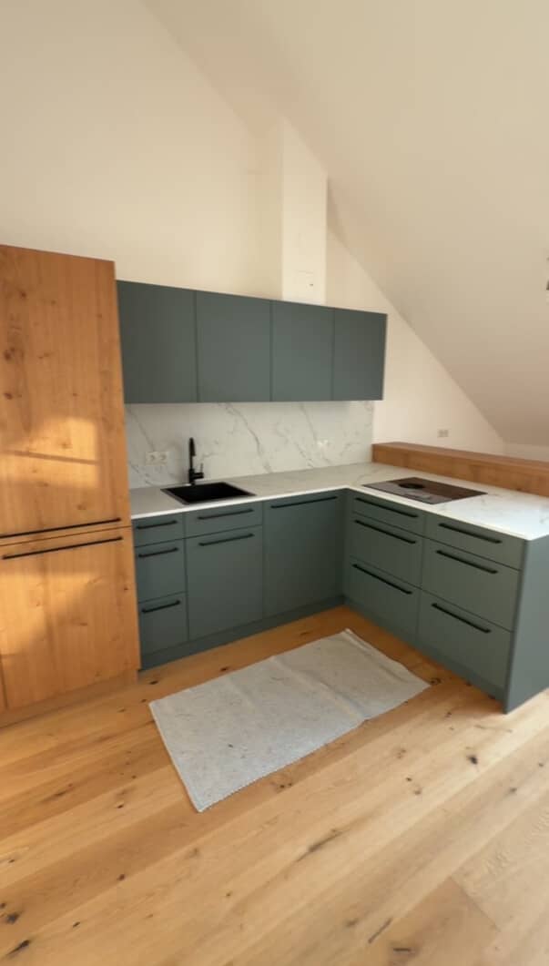 Dachgeschosswohnung with terrace and custom kitchen renovated in 2024