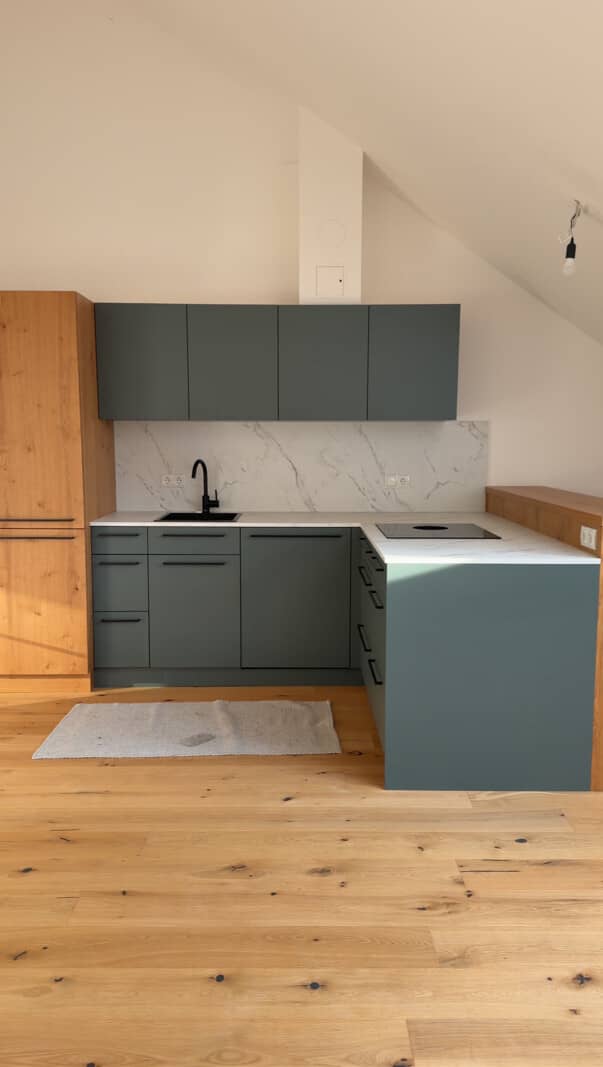 Dachgeschosswohnung with terrace and custom kitchen renovated in 2024