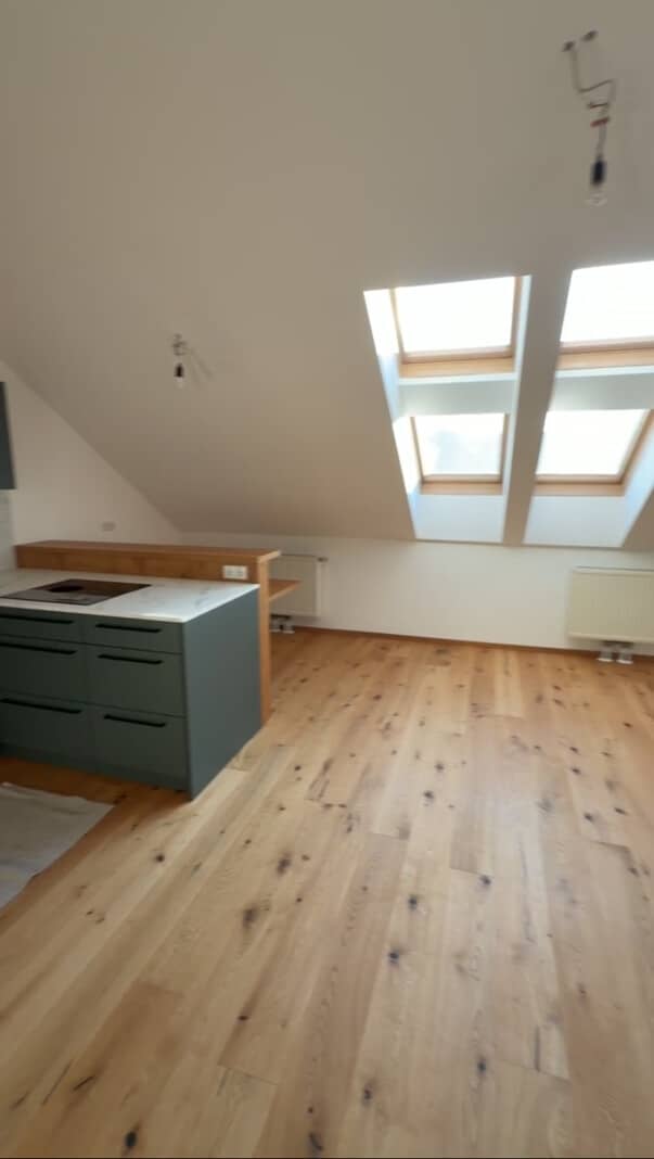 Dachgeschosswohnung with terrace and custom kitchen renovated in 2024