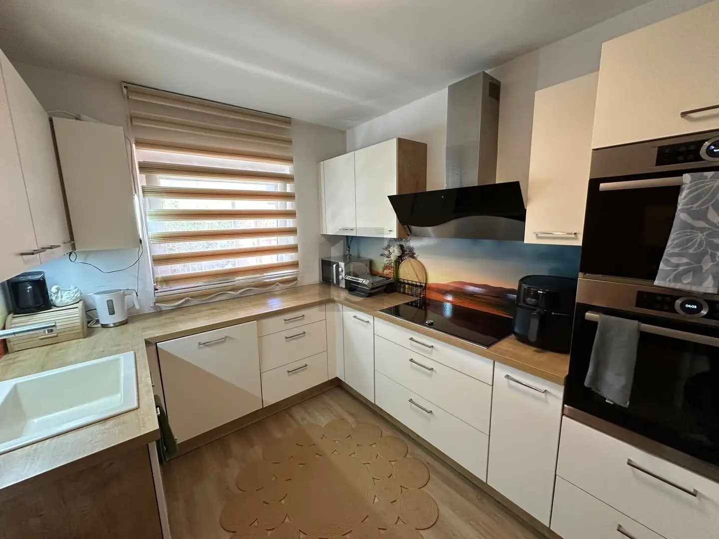 Erdgeschosswohnung mit Privatgarten und Balkon