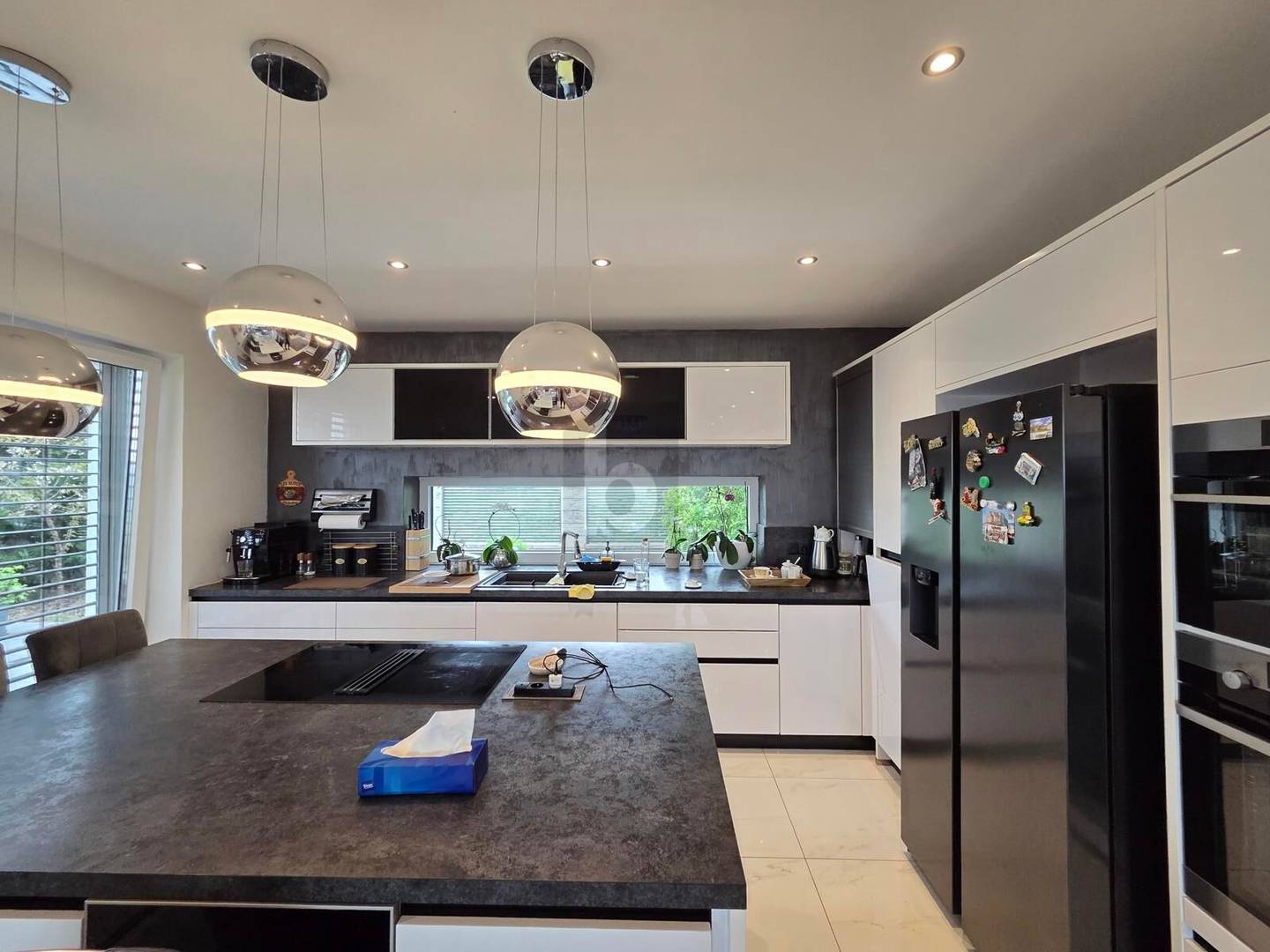 Neuwertige Familienwohnung mit Garten und Golfplatzblick