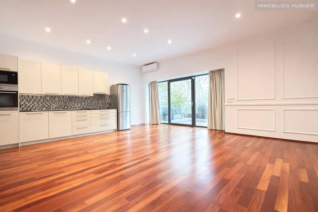 Apartment with spacious living area and terrace with green view