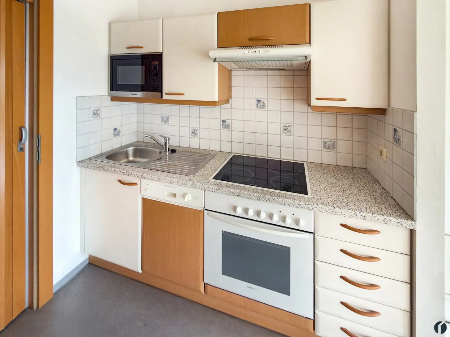 Well-maintained condominium with covered balcony