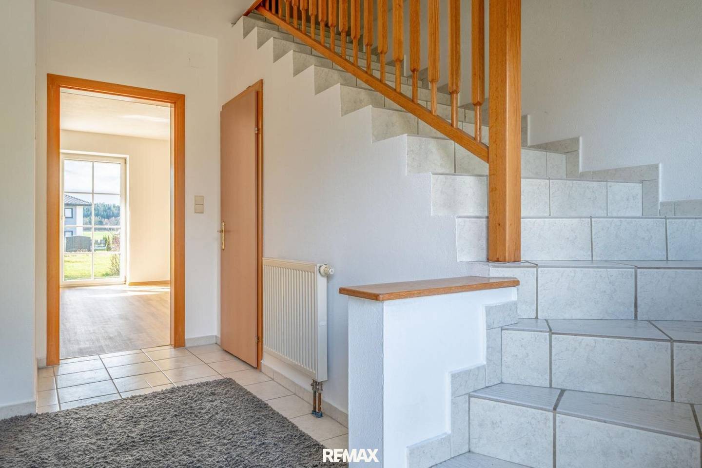 Maisonettewohnung mit Terrasse und Carport