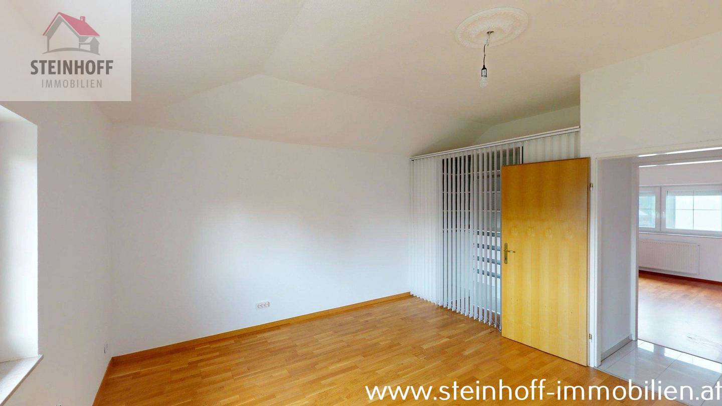 Spacious attic apartment with a loggia and wood burning stove