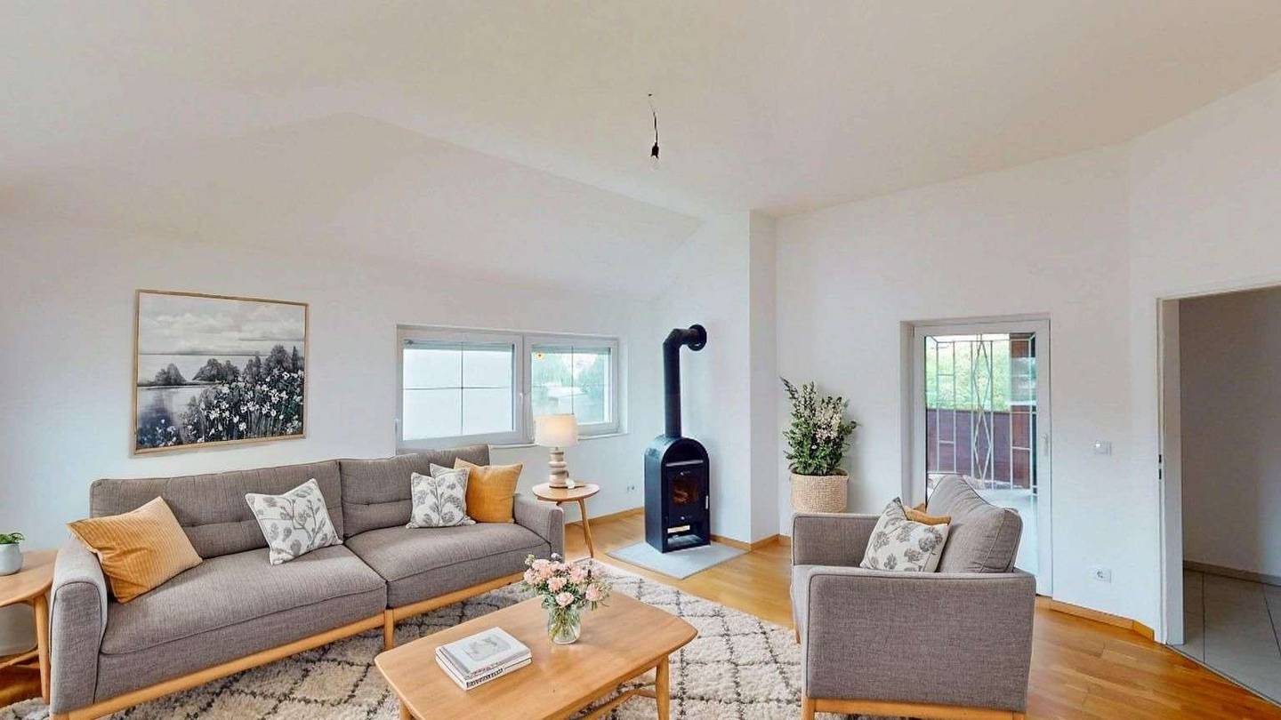 Spacious attic apartment with a loggia and wood burning stove