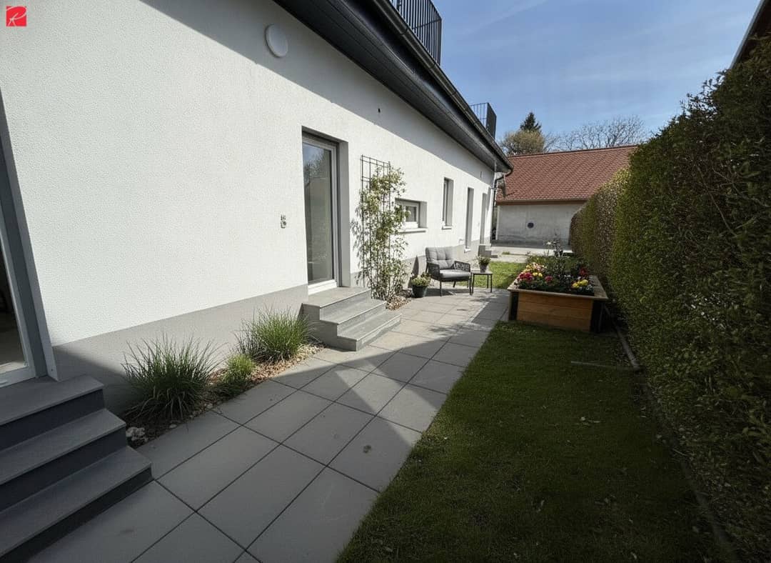 Gartenwohnung im Neubau mit Terrasse und Blick auf Schloss St Martin