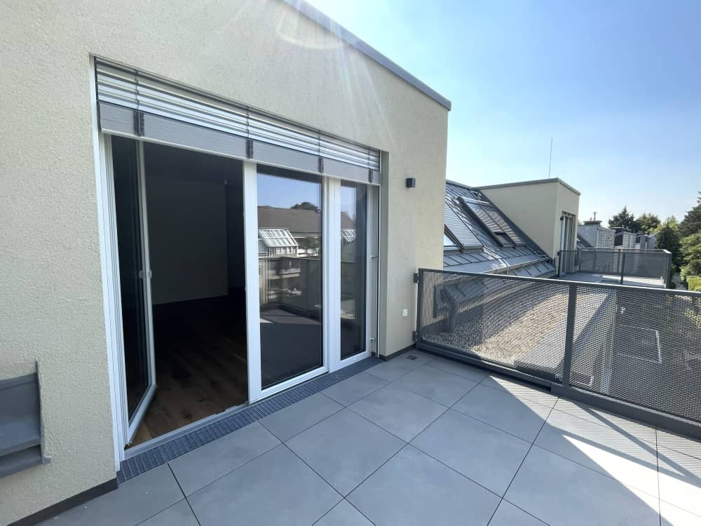 Attic apartment with balcony and green view