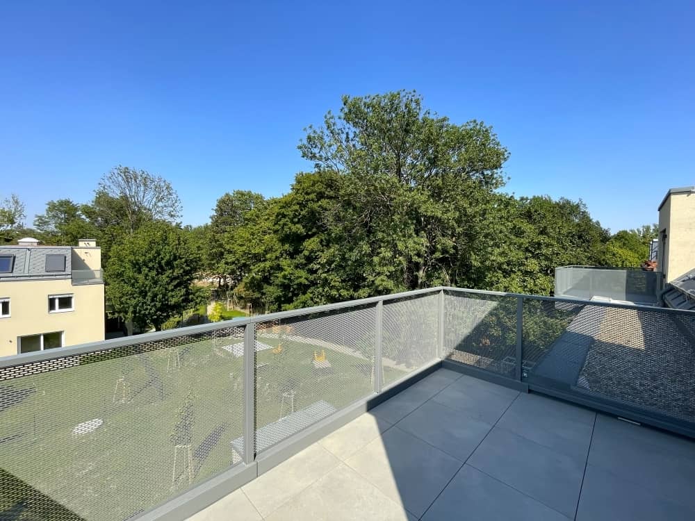 New top floor apartment with balcony
