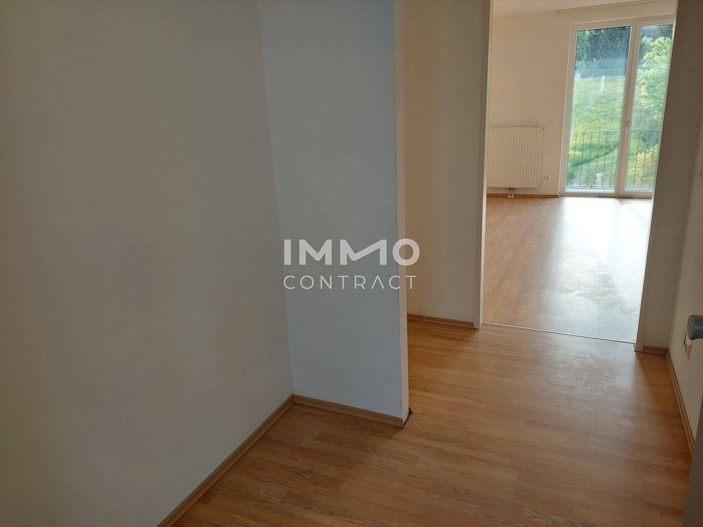 Bright top floor apartment with balcony and lift including underground parking