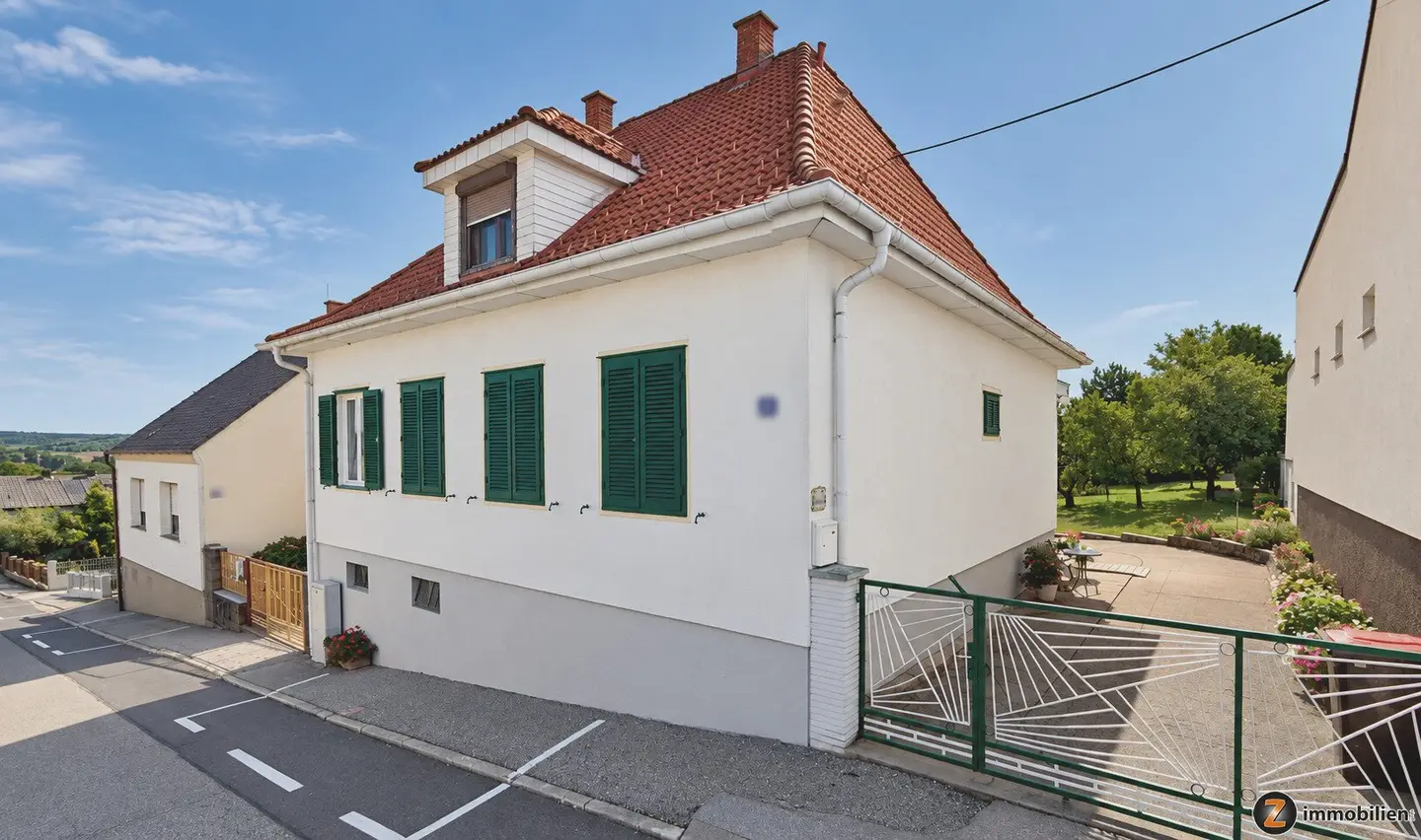 Single family house with outbuildings and well kept garden