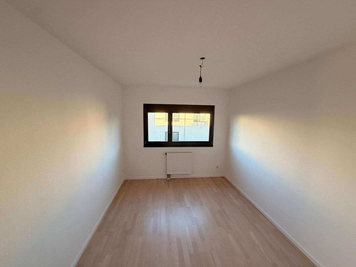Brightly renovated apartment with west facing balcony in a quiet location