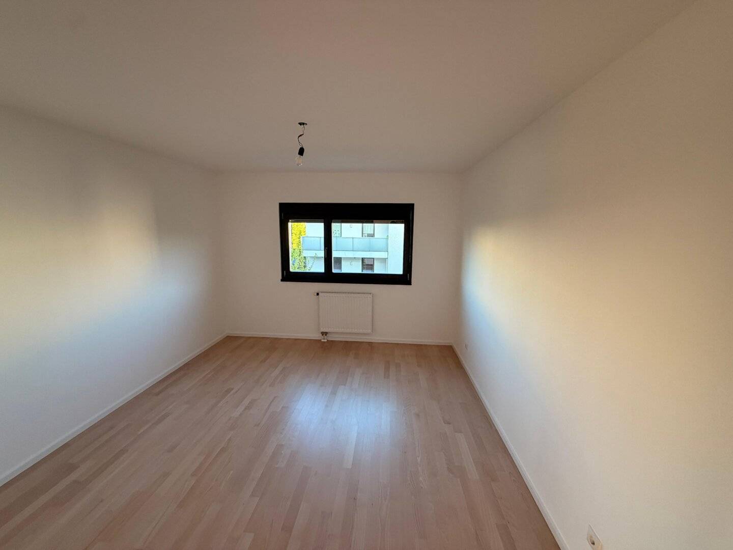 Brightly renovated apartment with west facing balcony in a quiet location