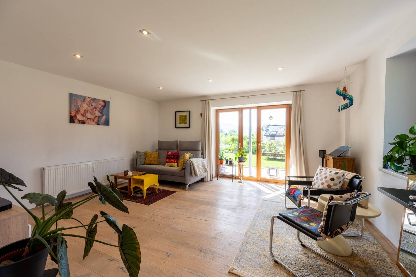 Erdgeschosswohnung mit privatem Garten und Pool