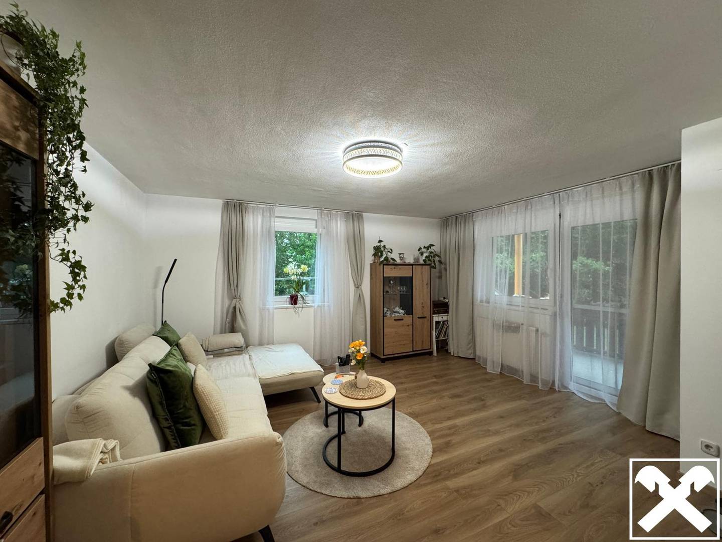 Erdgeschosswohnung mit Gartenflair und Balkon