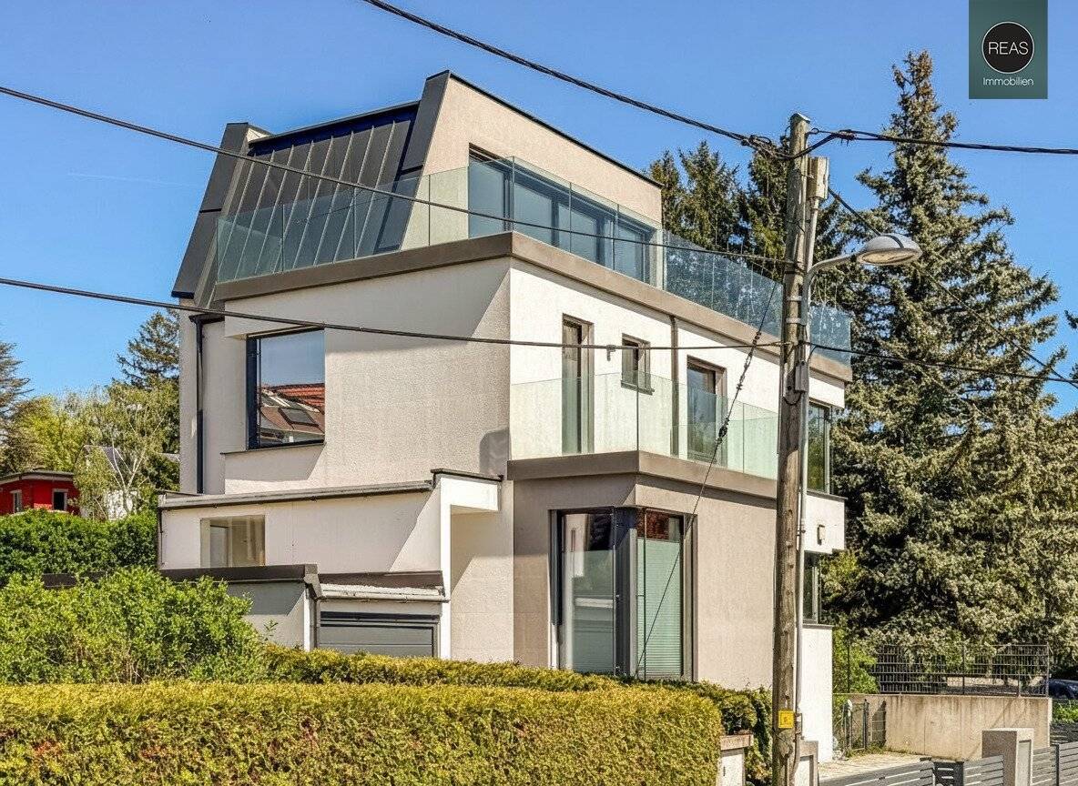 Hochwertig ausgestattete Luxusvilla mit Naturpool am Wolfersberg!