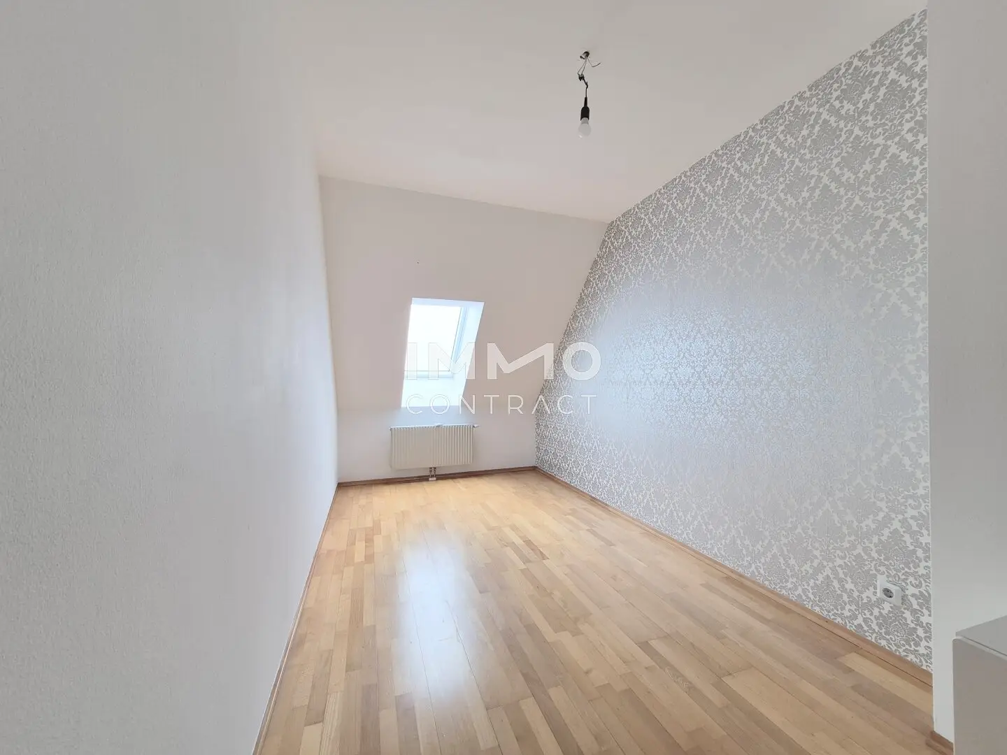 2-Zi-DG-Wohnung mit Grünblick, Terrasse & Garage
