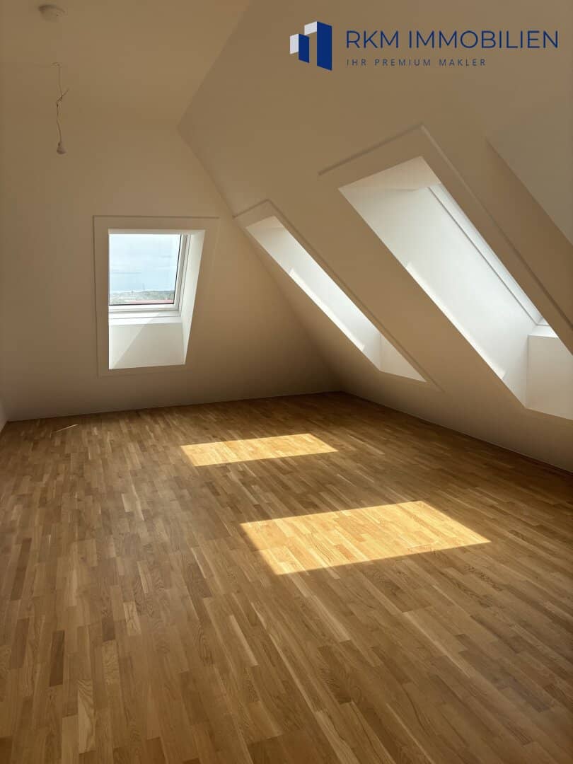 Erstbezug Dachgeschosswohnung mit drei Terrassen