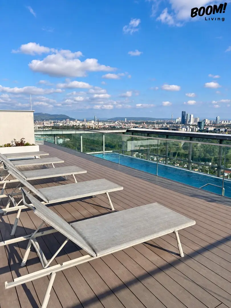 Modern living in the Triiiple Tower – Exclusive 2-room apartment with balcony &amp; rooftop pool
