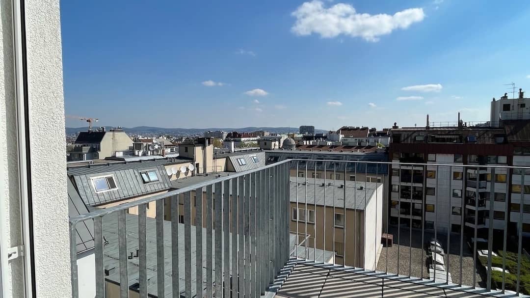 New build top floor apartment with two balconies