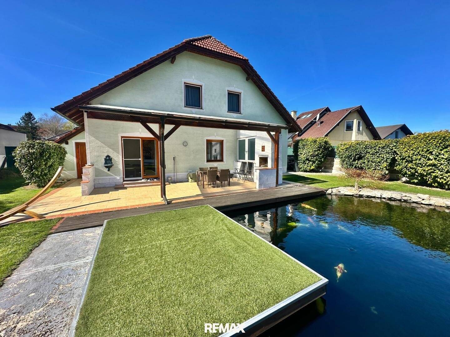Single-Family Home with Pool and Swimming Pond