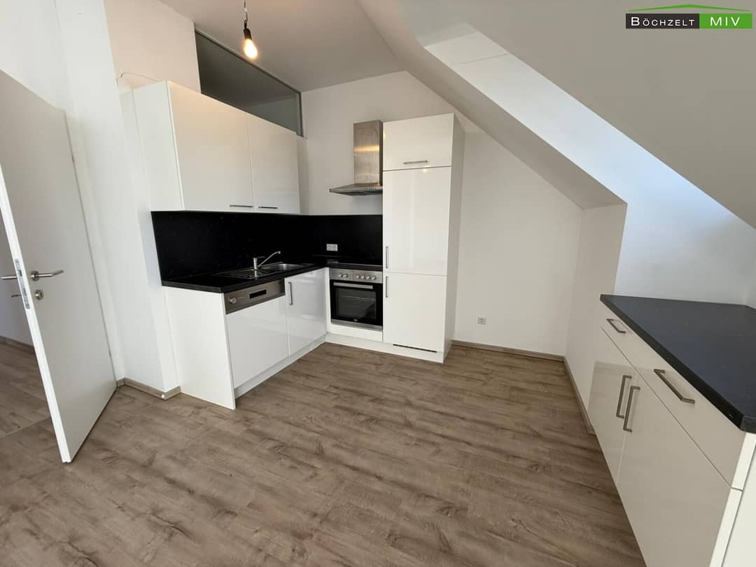 Top floor apartment with furnished kitchen