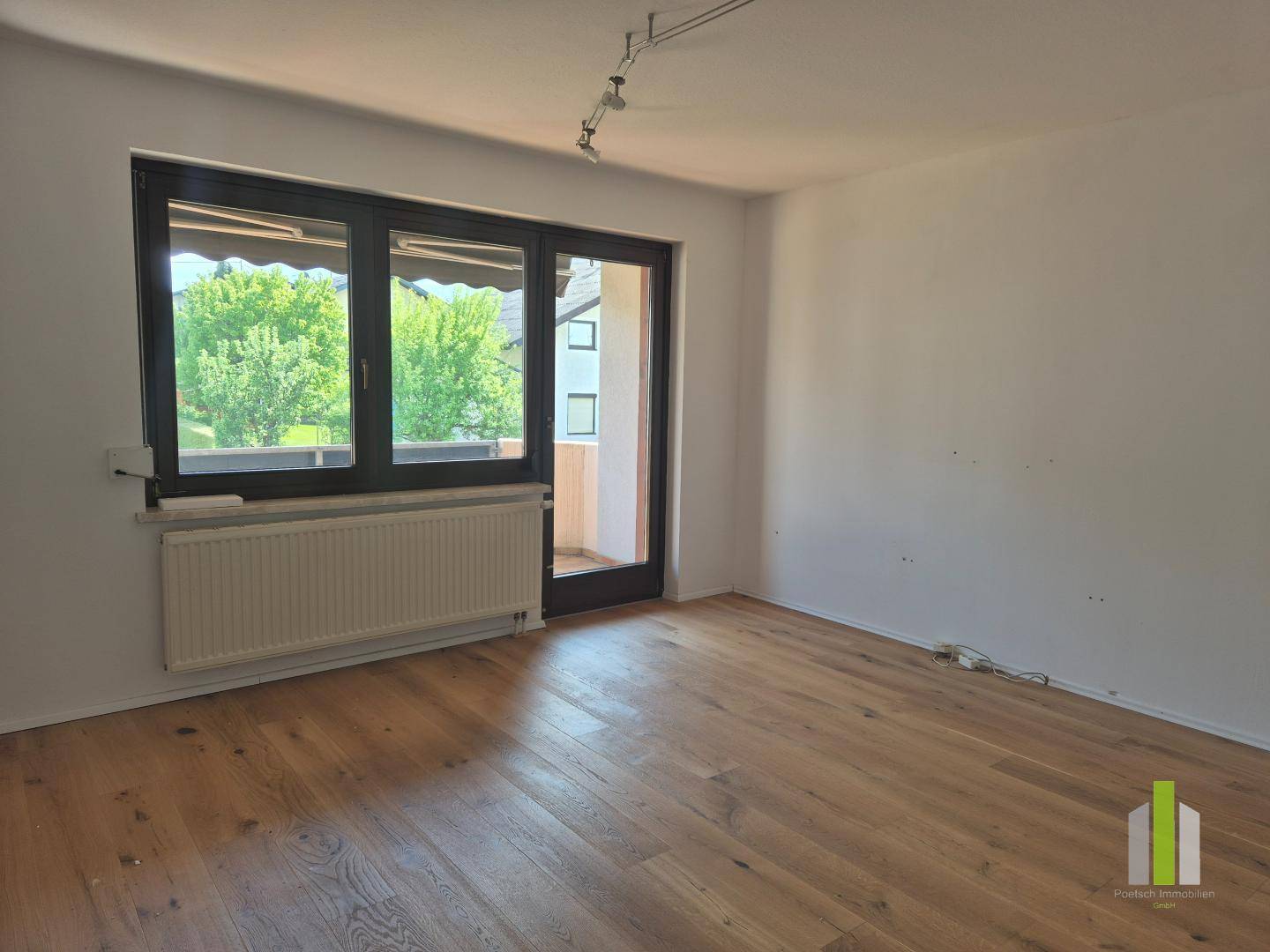 Sonnige Wohnung mit Balkon und Garage