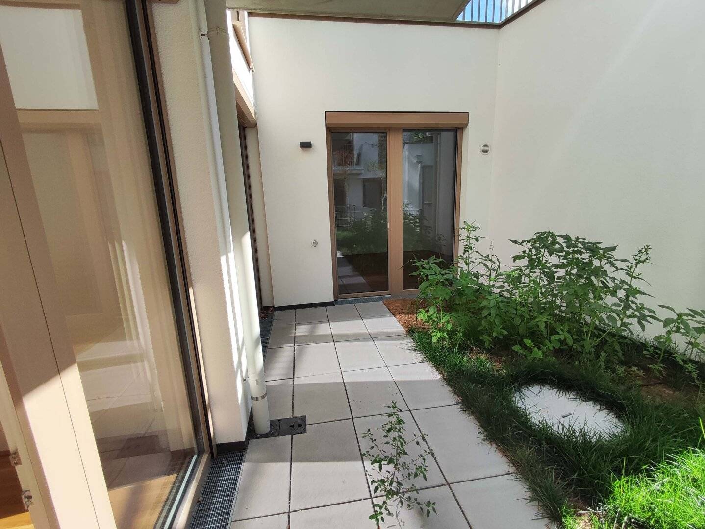 Quiet garden apartment New build 3-room first occupancy with terrace Top 2/2