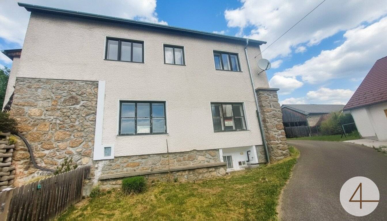 Einfamilienhaus mit Werkstatt im Stadtkern