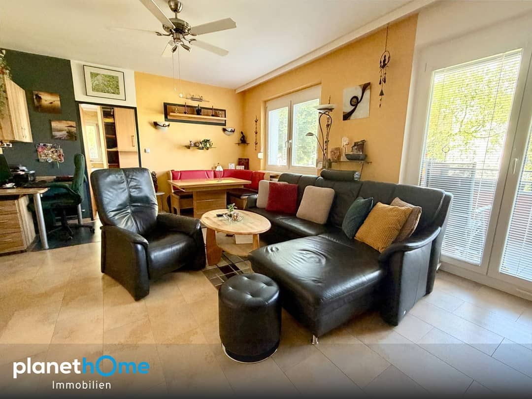 Apartment with balcony and garage in a quiet location