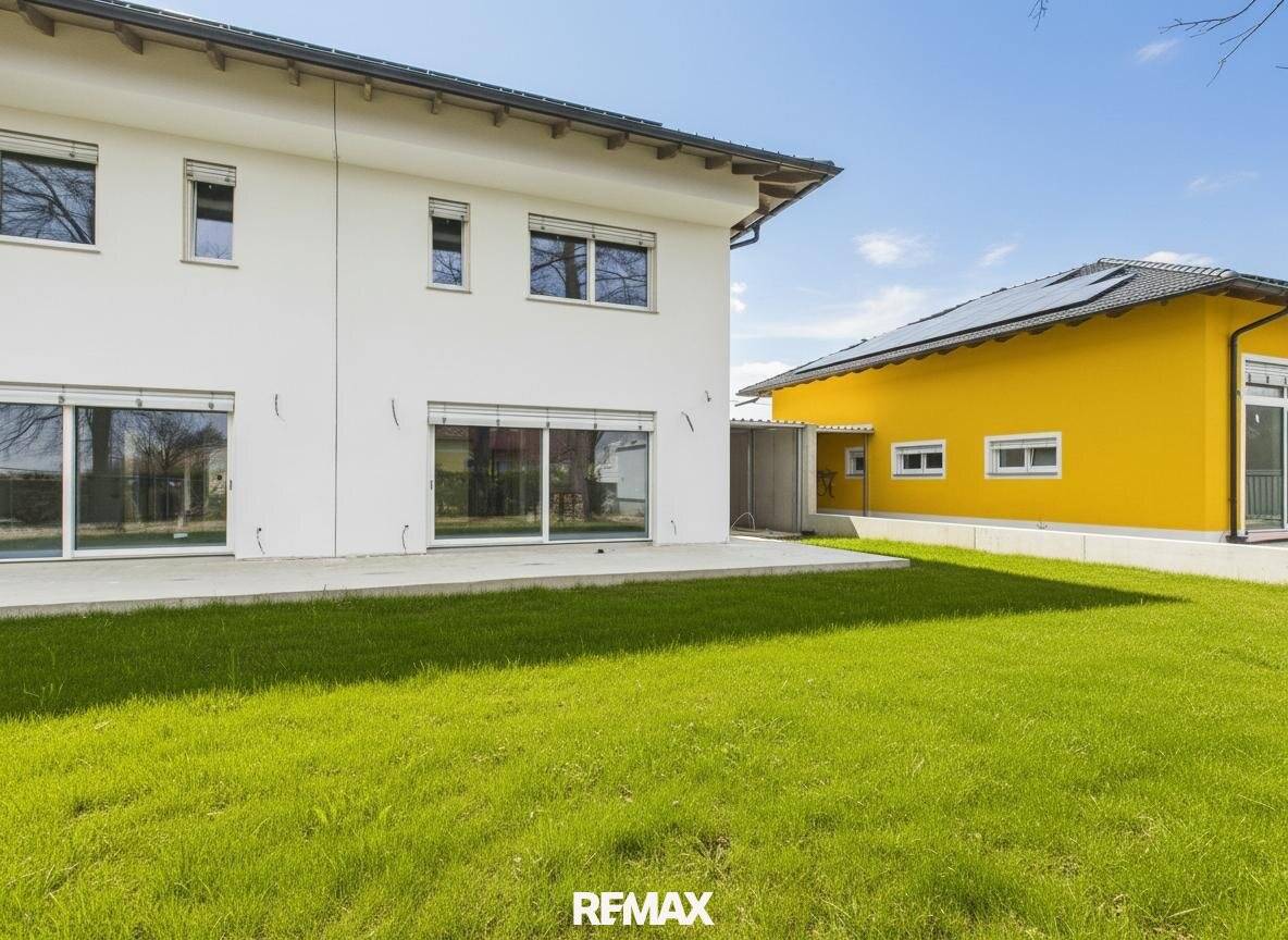Energy-Autonomous Semi-Detached House with Garden